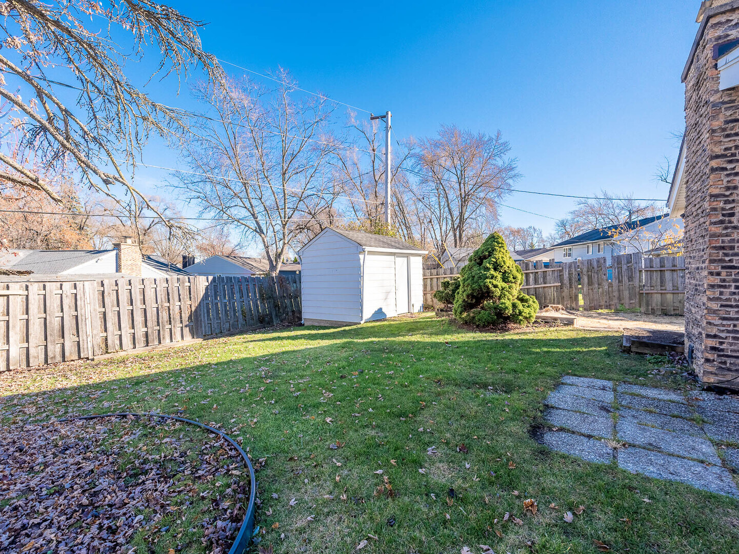 724 Surrey Drive Streamwood, IL 60107 - Photo 14 of 14 a backyard of a house with lots of green space