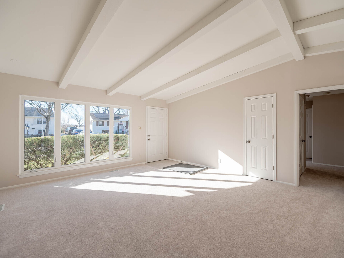 724 Surrey Drive Streamwood, IL 60107 - Photo 2 of 14 a view of empty room with floor to ceiling window