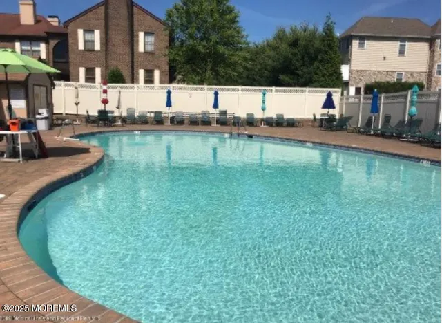 a swimming pool with outdoor view