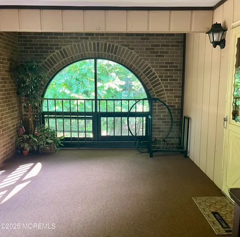 an empty room with a fireplace