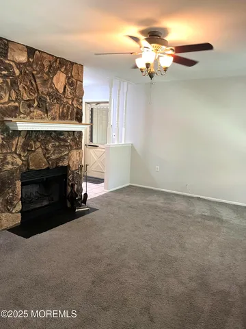 a view of a livingroom with a fireplace
