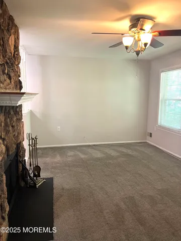 a view of a room with a sink and a window