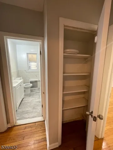 a view of a bathroom from a empty room