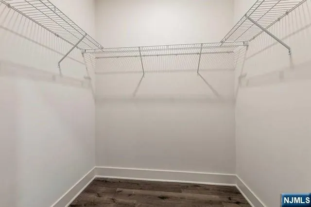 a view of a room with racks on the wall