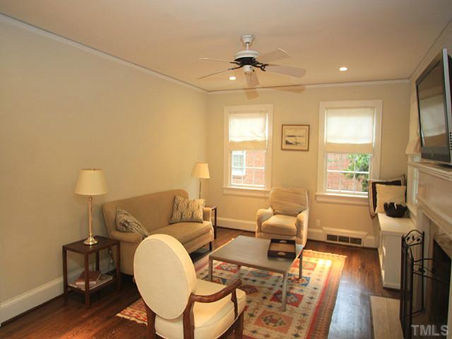16 Henderson Street Raleigh, NC 27607 - Photo 3 of 12 a living room with furniture and a flat screen tv