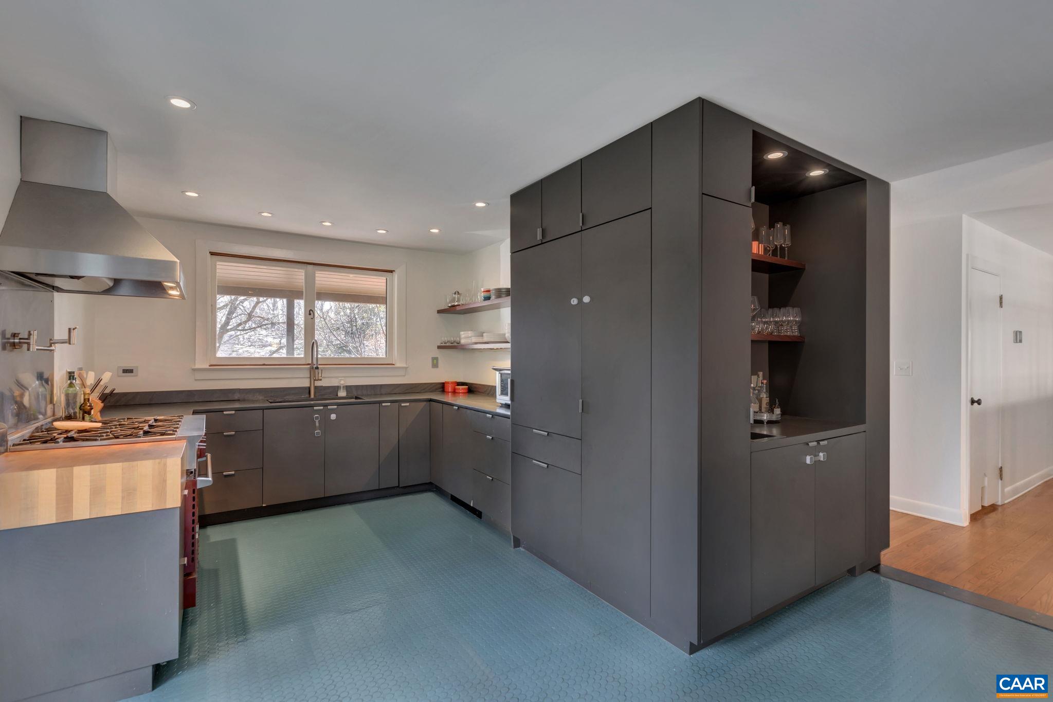 1717 Meadowbrook Heights Road Charlottesville, VA 22901 - Photo 11 of 43 a kitchen with refrigerator and window