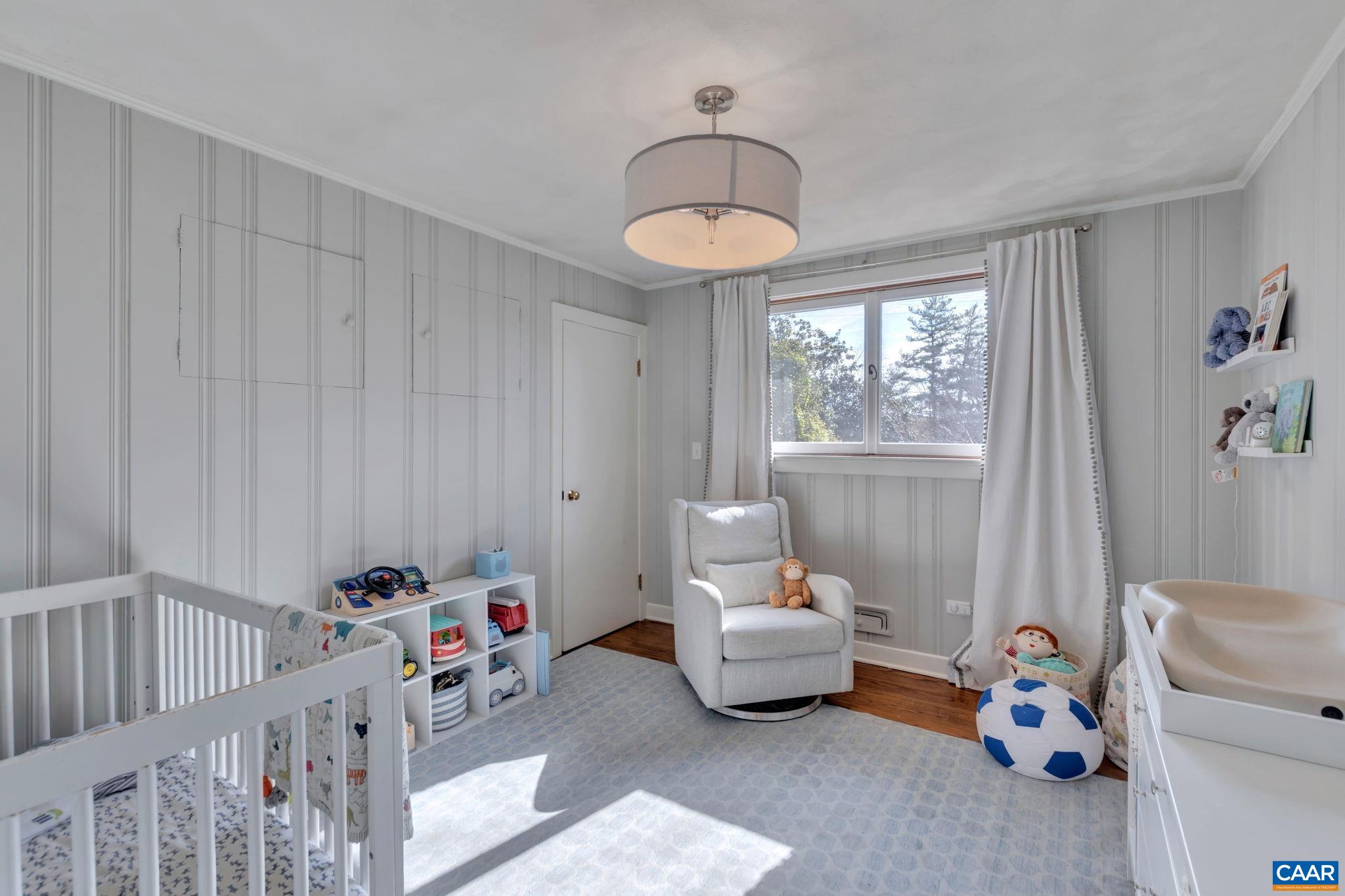 1717 Meadowbrook Heights Road Charlottesville, VA 22901 - Photo 20 of 43 a bedroom with furniture and a window