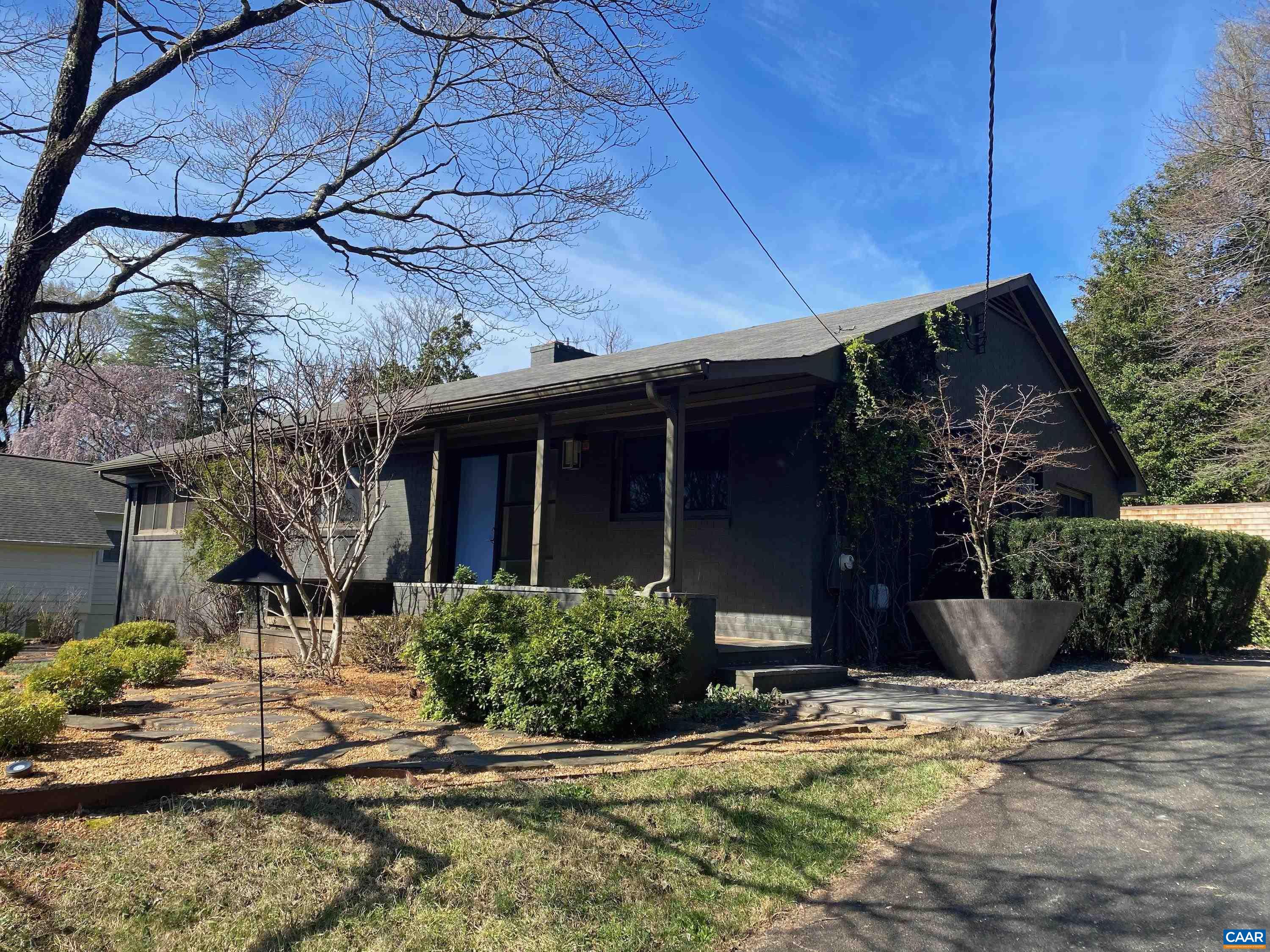 1717 Meadowbrook Heights Road Charlottesville, VA 22901 - Photo 2 of 43 a front view of a house with a yard