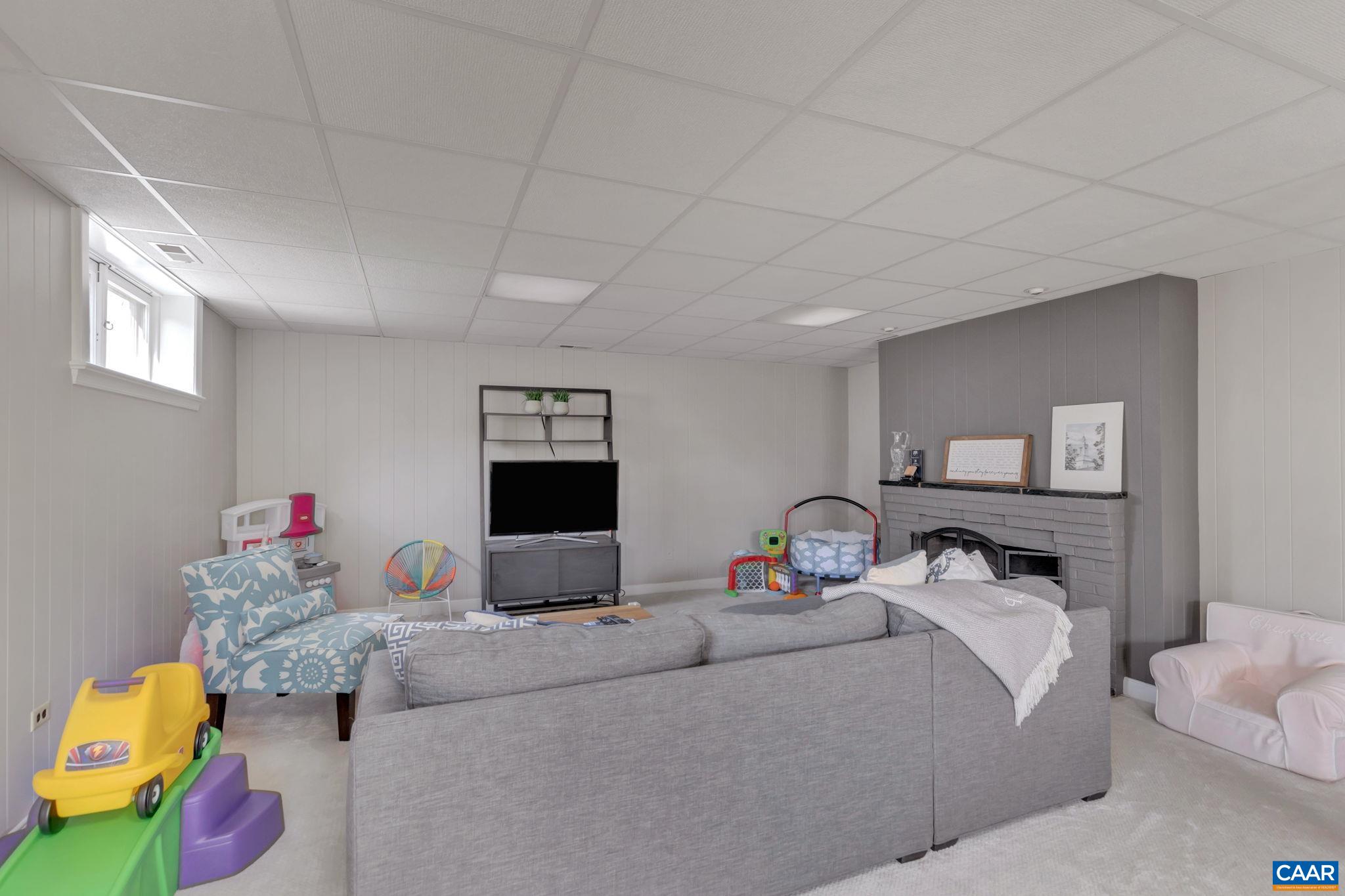 1717 Meadowbrook Heights Road Charlottesville, VA 22901 - Photo 26 of 43 a bedroom with a bed and a tv