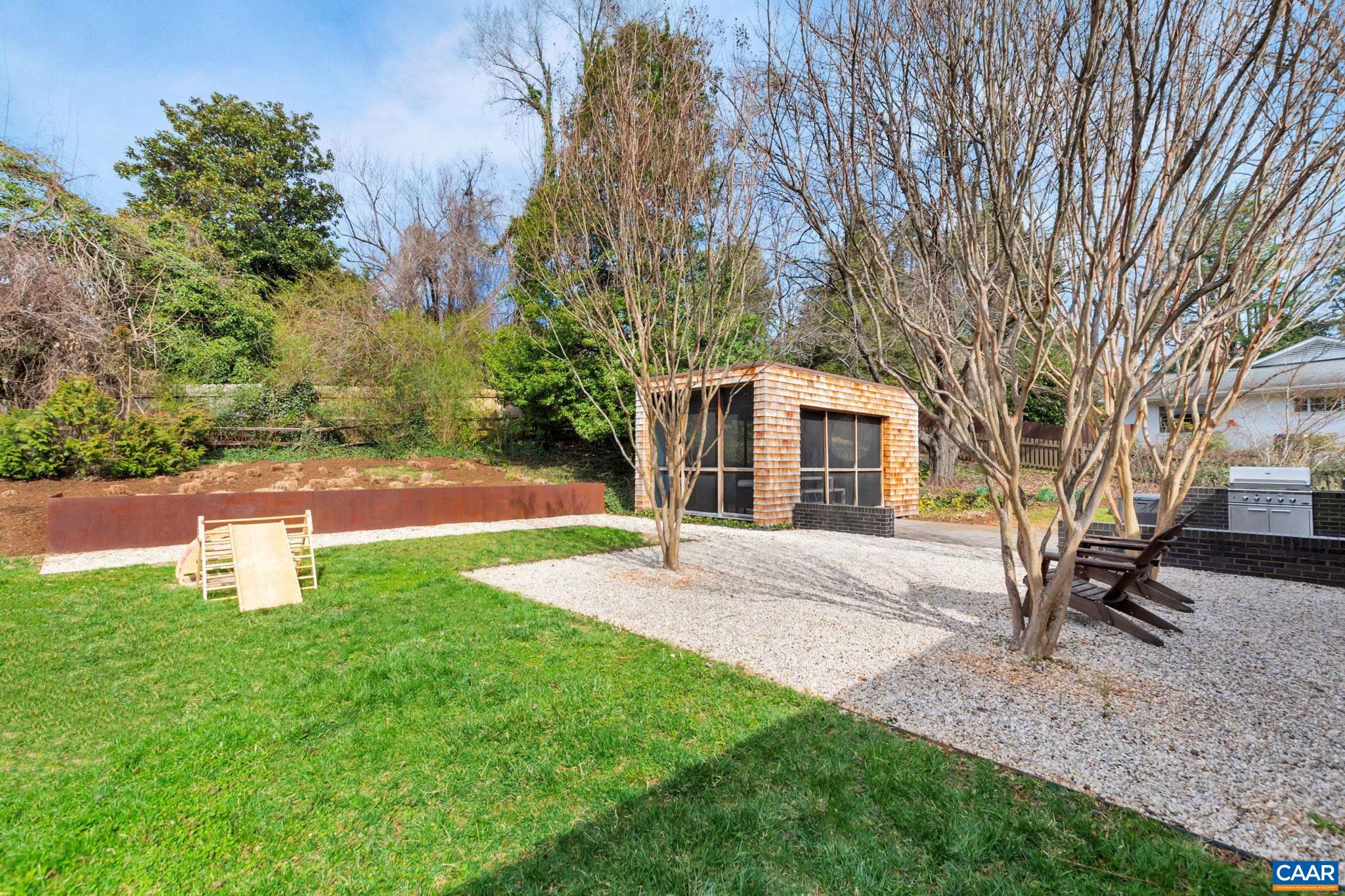 1717 Meadowbrook Heights Road Charlottesville, VA 22901 - Photo 30 of 43 a view of a house with backyard and a tree