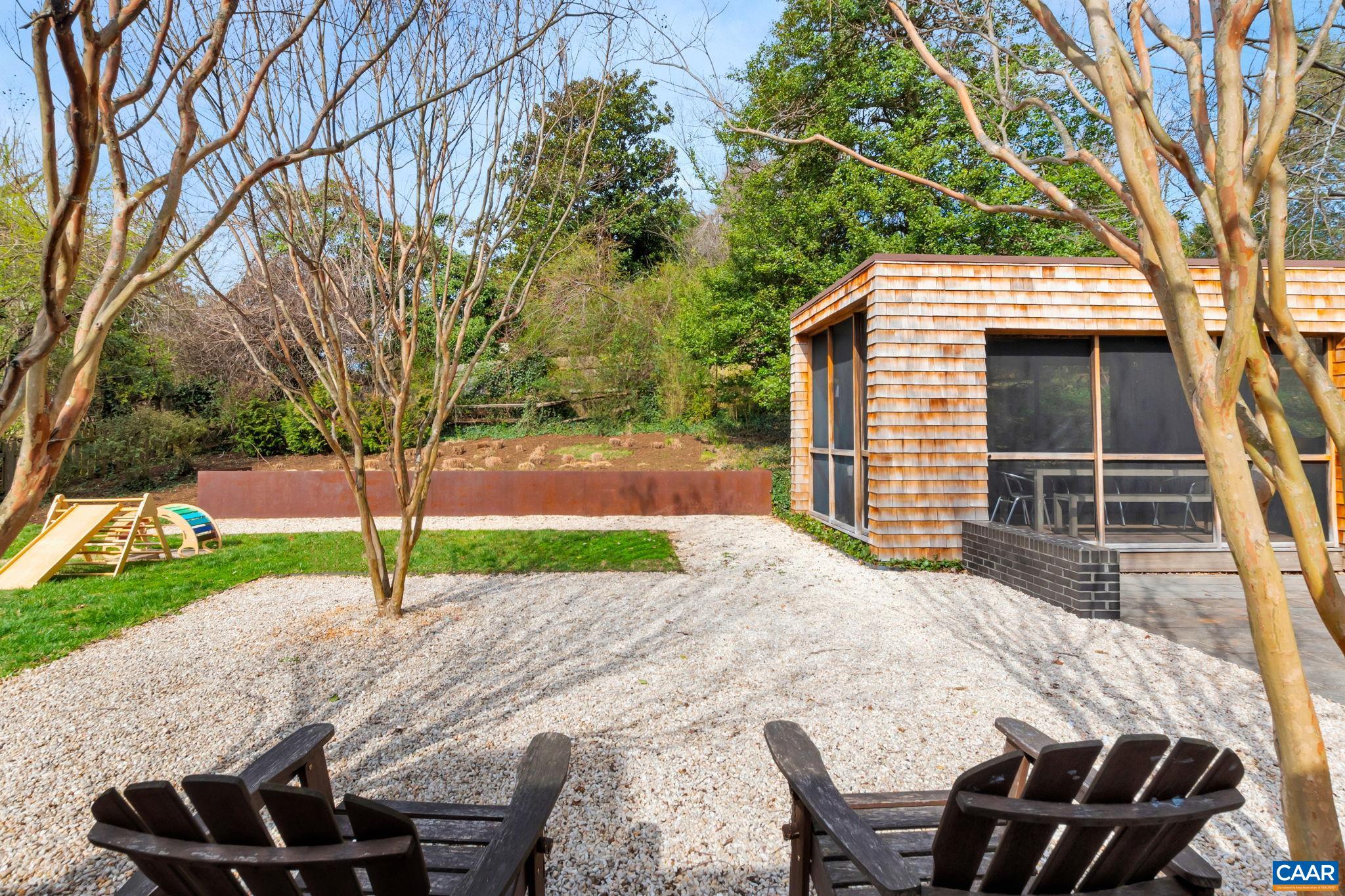 1717 Meadowbrook Heights Road Charlottesville, VA 22901 - Photo 31 of 43 a view of backyard with wooden fence and trees