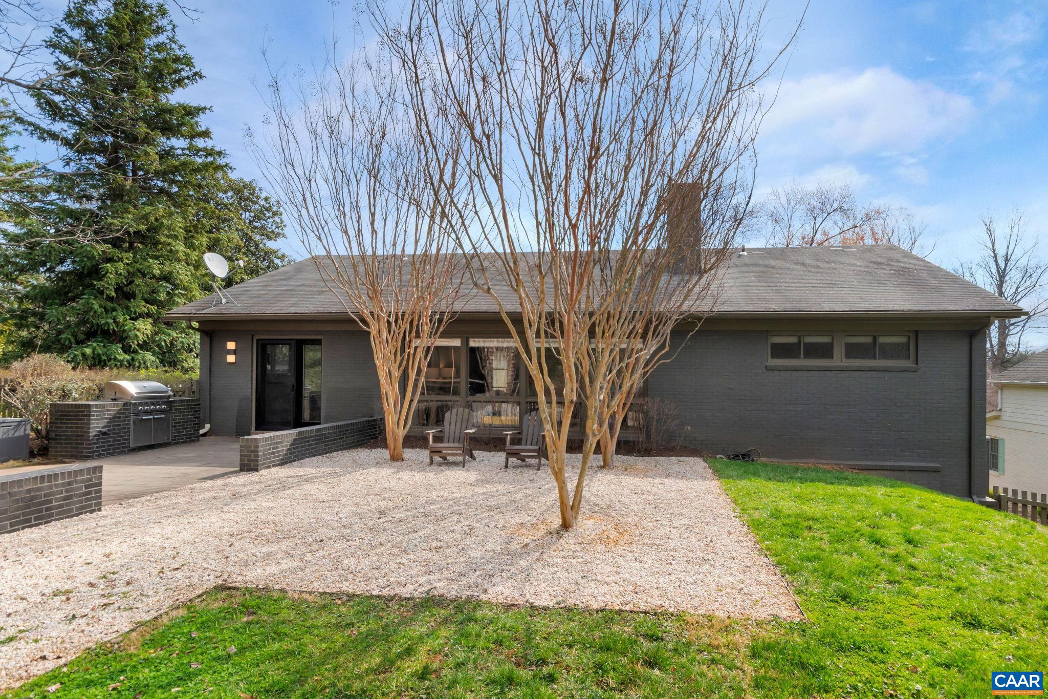 1717 Meadowbrook Heights Road Charlottesville, VA 22901 - Photo 38 of 43 a front view of a house with garden