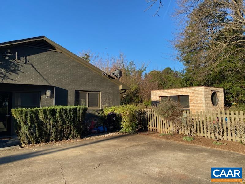 1717 Meadowbrook Heights Road Charlottesville, VA 22901 - Photo 40 of 43 a front view of a house with a yard