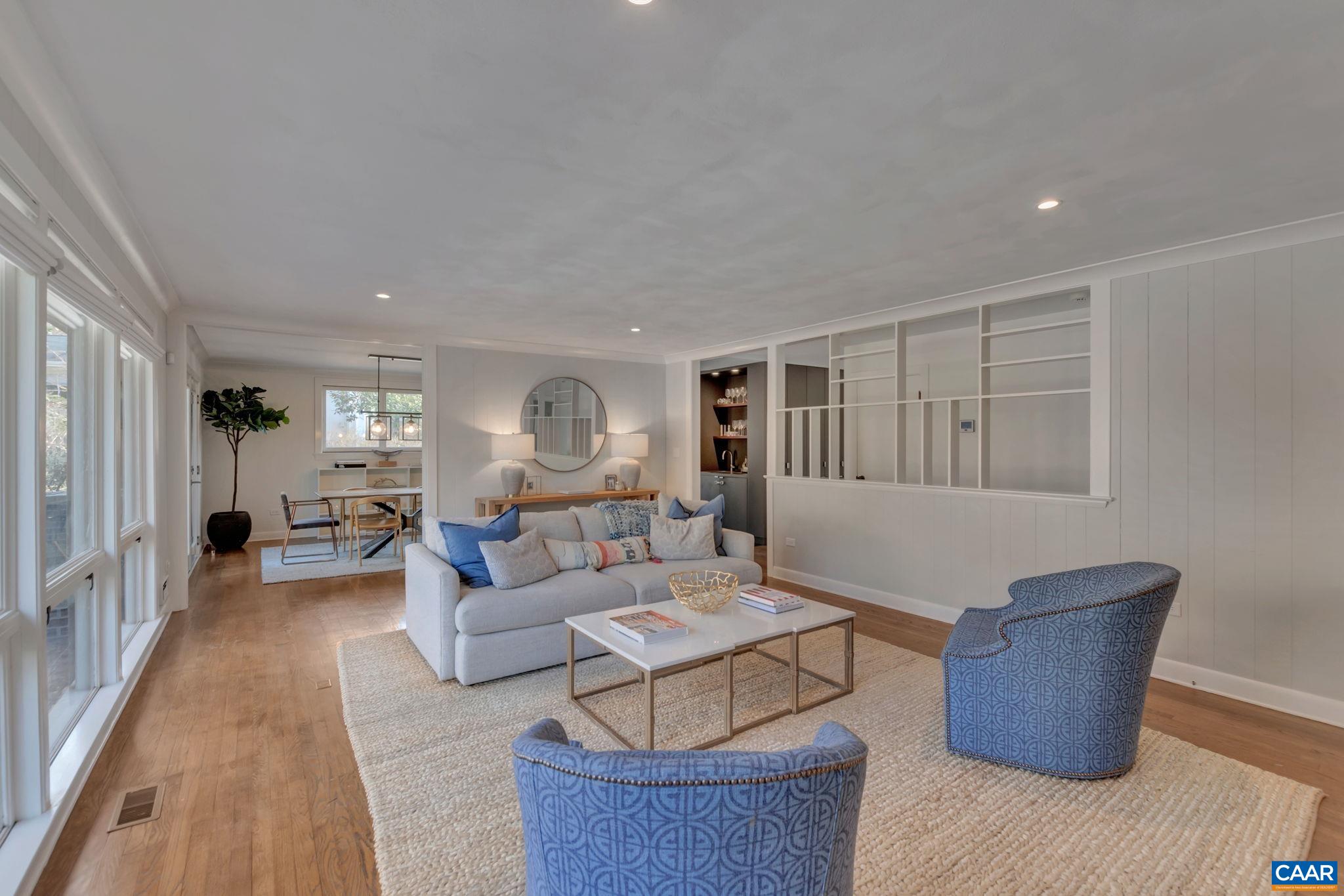 1717 Meadowbrook Heights Road Charlottesville, VA 22901 - Photo 7 of 43 a living room with furniture and a window