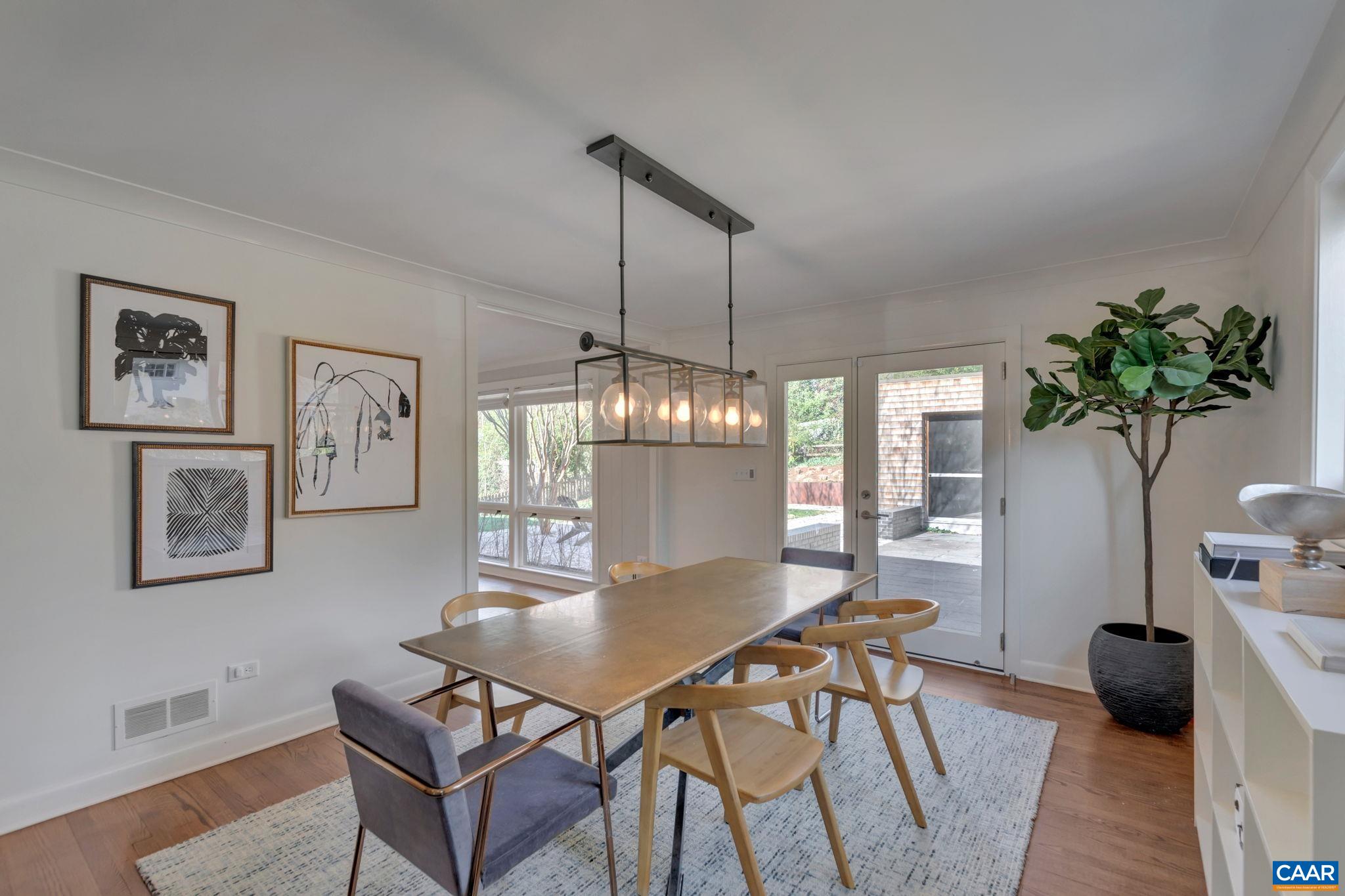 1717 Meadowbrook Heights Road Charlottesville, VA 22901 - Photo 9 of 43 a view of a dining room with furniture and window
