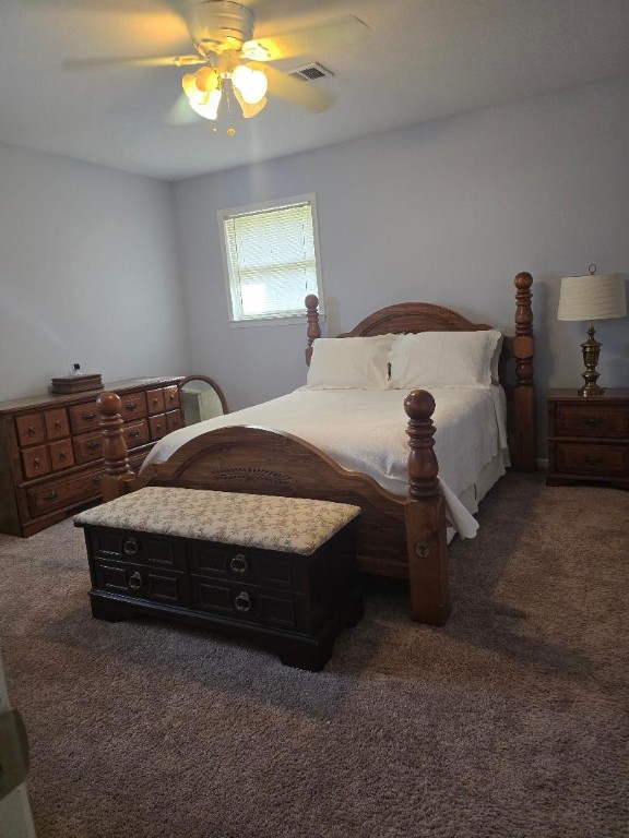 1930 5th Street Hempstead, TX 77445 - Photo 19 of 24 a bedroom with a bed and window