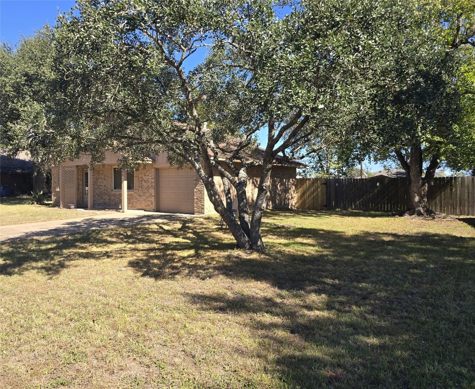 1930 5th Street Hempstead, TX 77445 - Photo 3 of 24 a view of back yard of the house