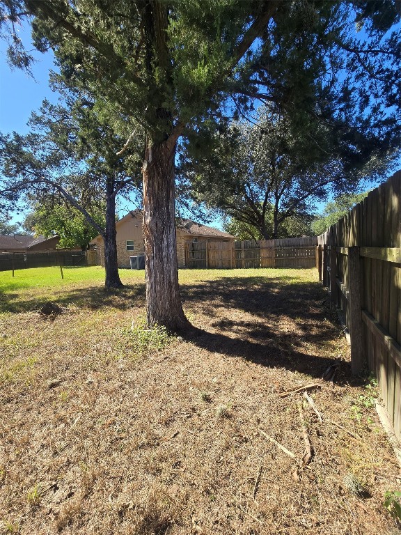 1930 5th Street Hempstead, TX 77445 - Photo 5 of 24 a view of yard with tree