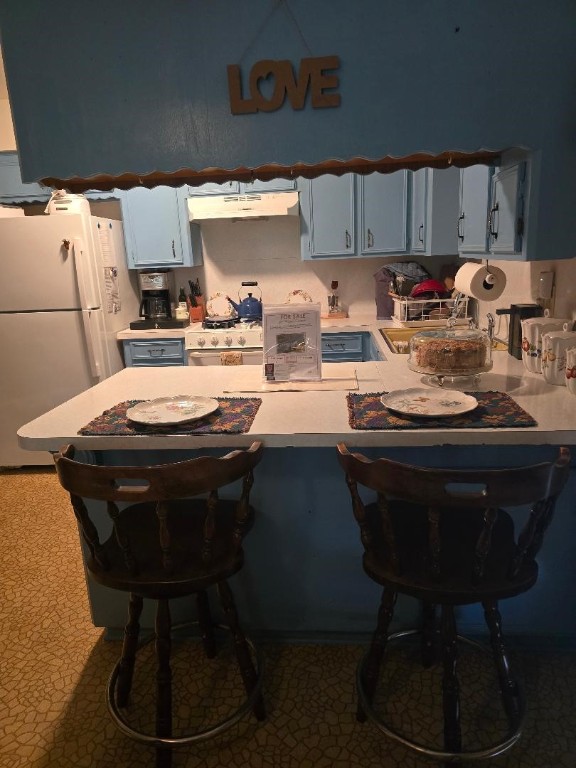 1930 5th Street Hempstead, TX 77445 - Photo 10 of 24 a kitchen with a sink appliances and cabinets