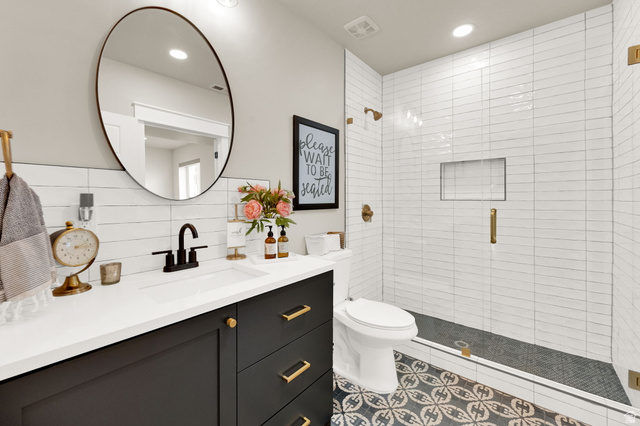 1132 South 1300th Street West Mapleton, UT 84664 - Photo 38 of 52 Modern bathroom featuring a dark wood-finish vanity with a white countertop and integrated sink