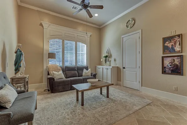 a kitchen with stainless steel appliances wooden floor dining table and chairs