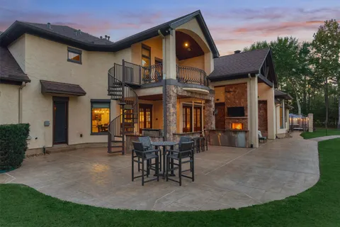 a view of a patio with a yard