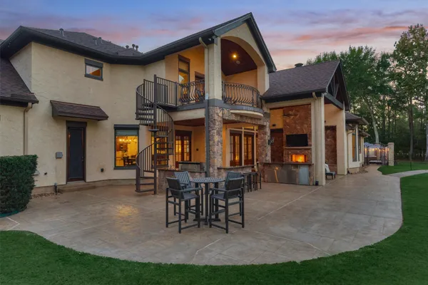 a view of a patio with a yard