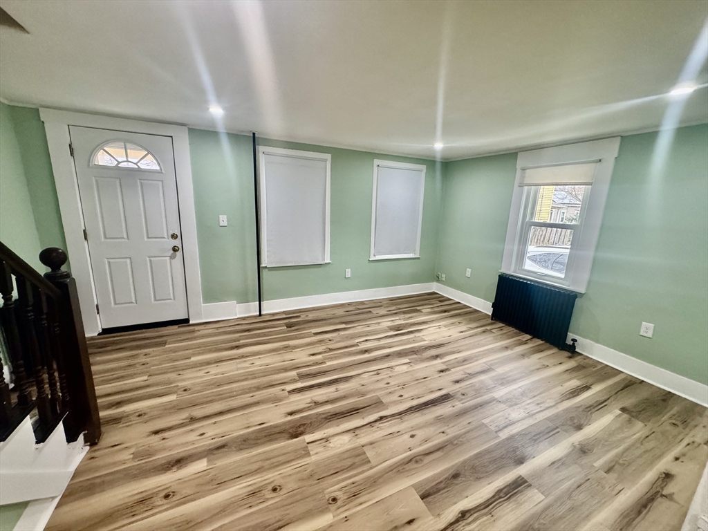 2 Wall Court Maynard, MA 01754 - Photo 5 of 11 a view of a room with wooden floor and windows