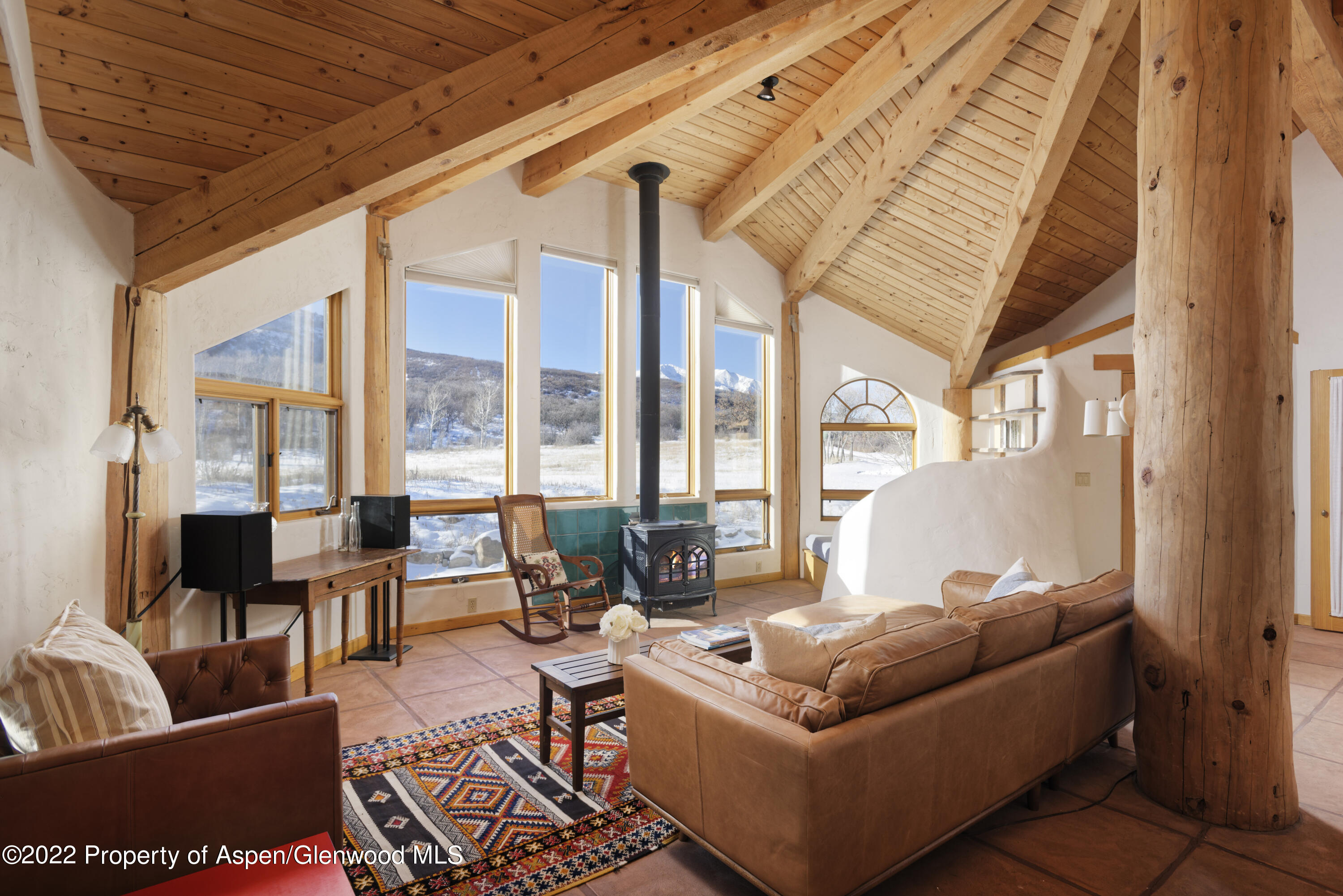 2651 Bear Ridge Road Basalt, CO 81621 - Photo 12 of 16 a living room with furniture and a large window