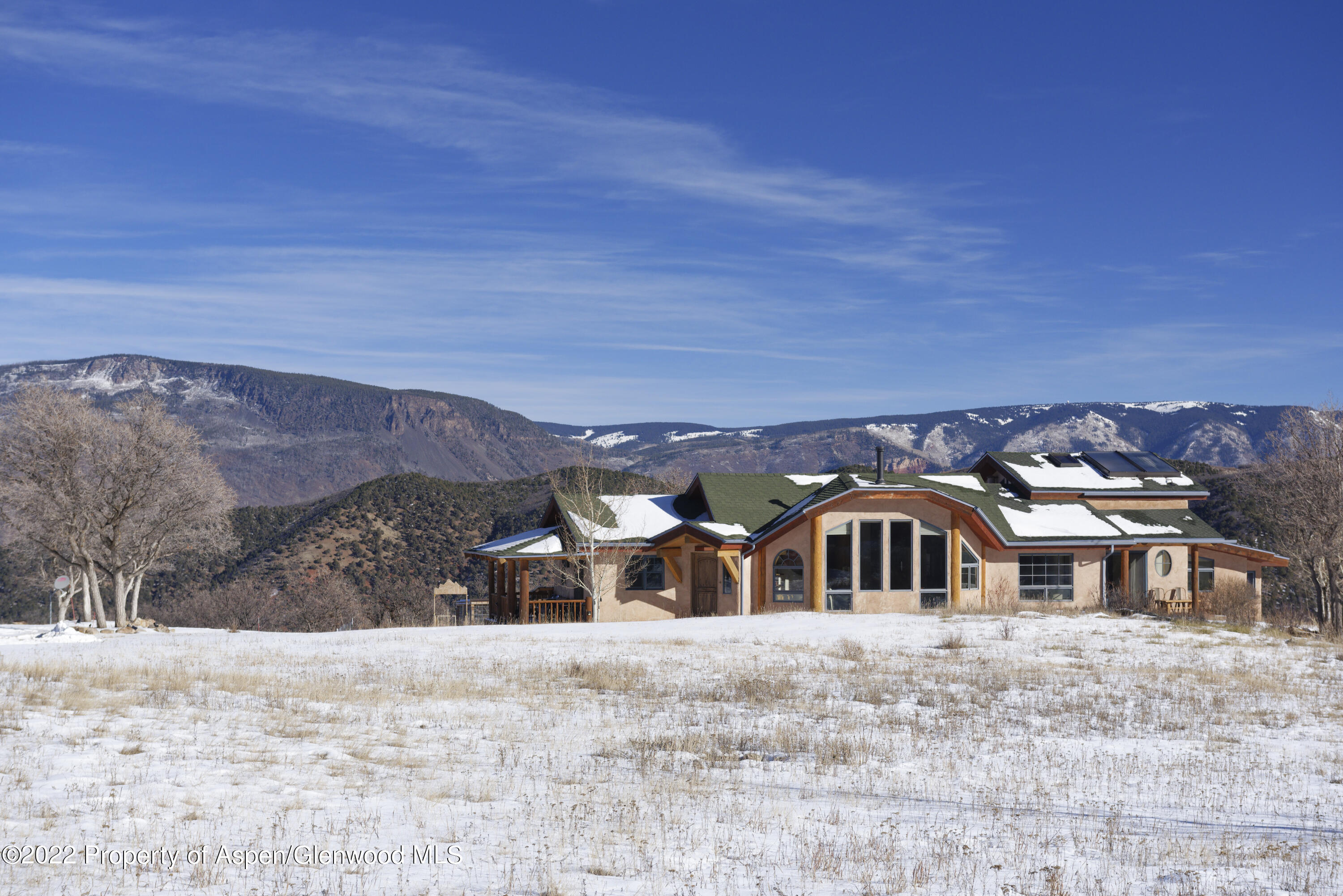 2651 Bear Ridge Road Basalt, CO 81621 - Photo 9 of 16 a front view of a house with a yard