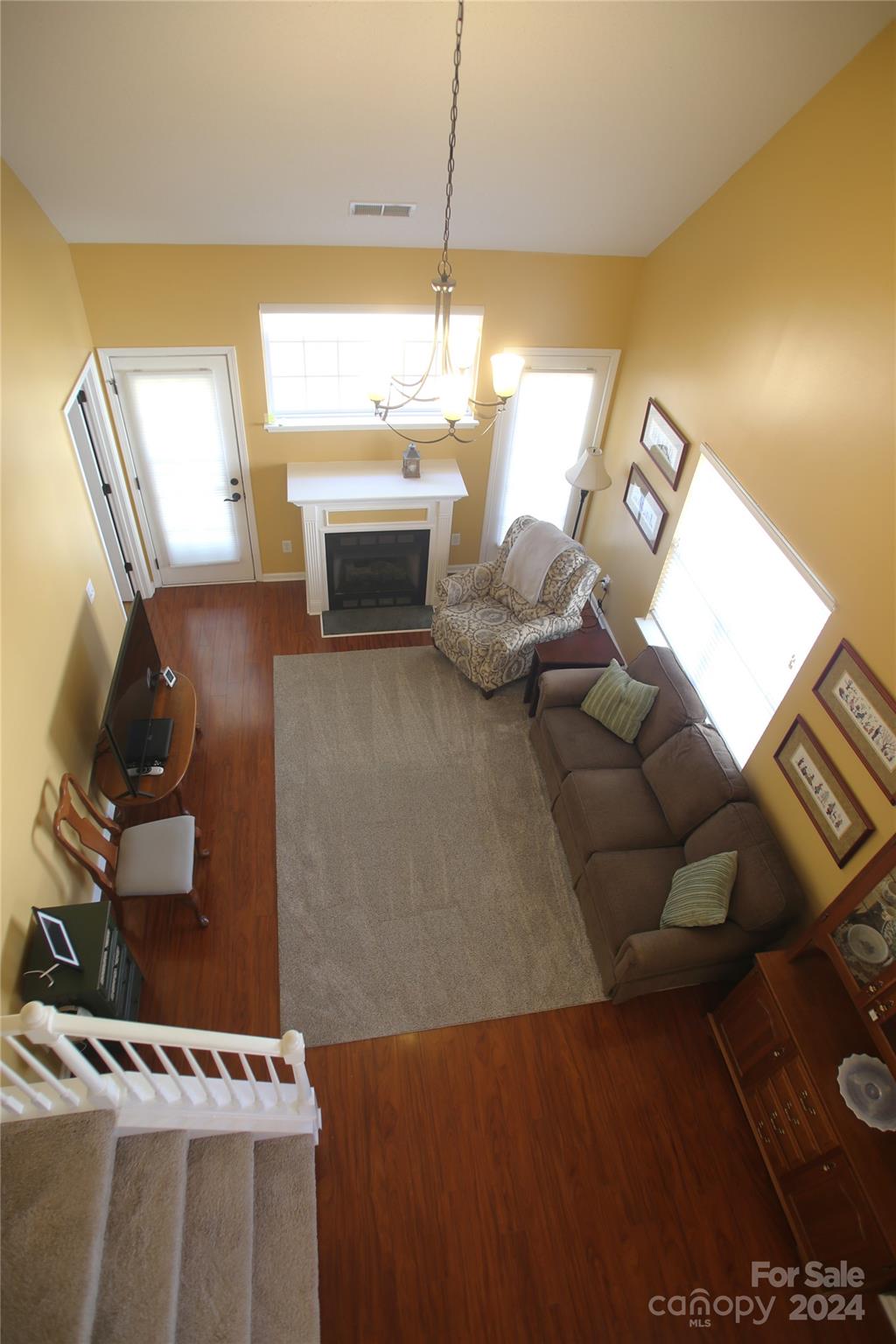 11330 Stone Trail Road Charlotte, NC 28213 - Photo 11 of 24 a living room with furniture and a window