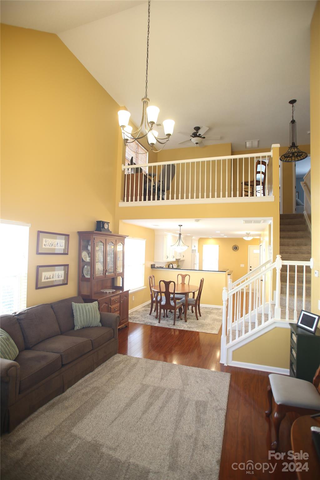 11330 Stone Trail Road Charlotte, NC 28213 - Photo 12 of 24 a living room with furniture and a chandelier