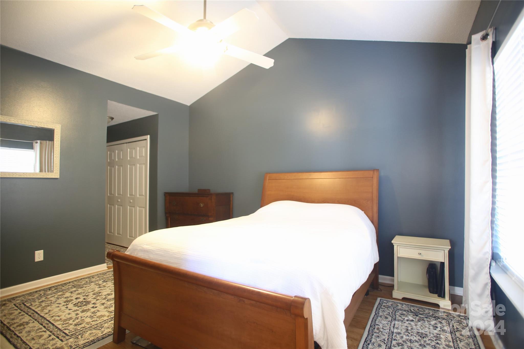 11330 Stone Trail Road Charlotte, NC 28213 - Photo 13 of 24 a room with a bed and a table