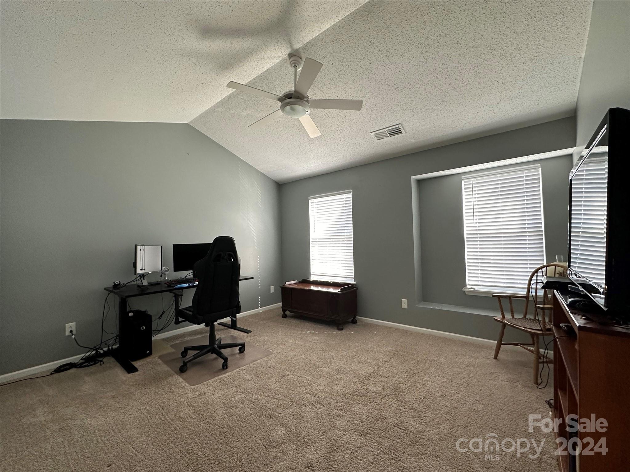 11330 Stone Trail Road Charlotte, NC 28213 - Photo 20 of 24 a view of a workspace with furniture and a window