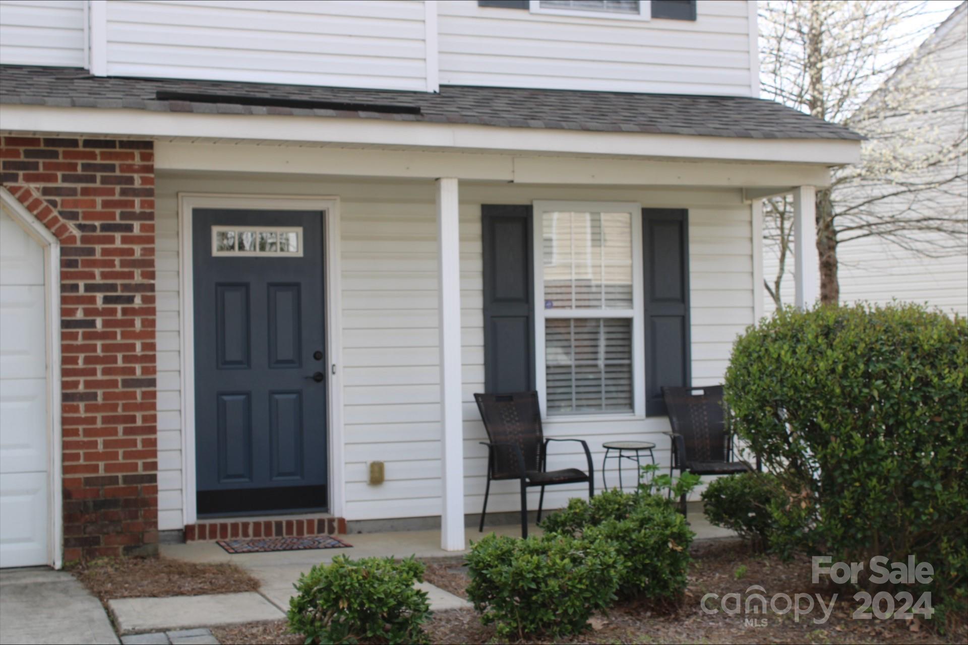 11330 Stone Trail Road Charlotte, NC 28213 - Photo 2 of 24 a front view of a house with a garden