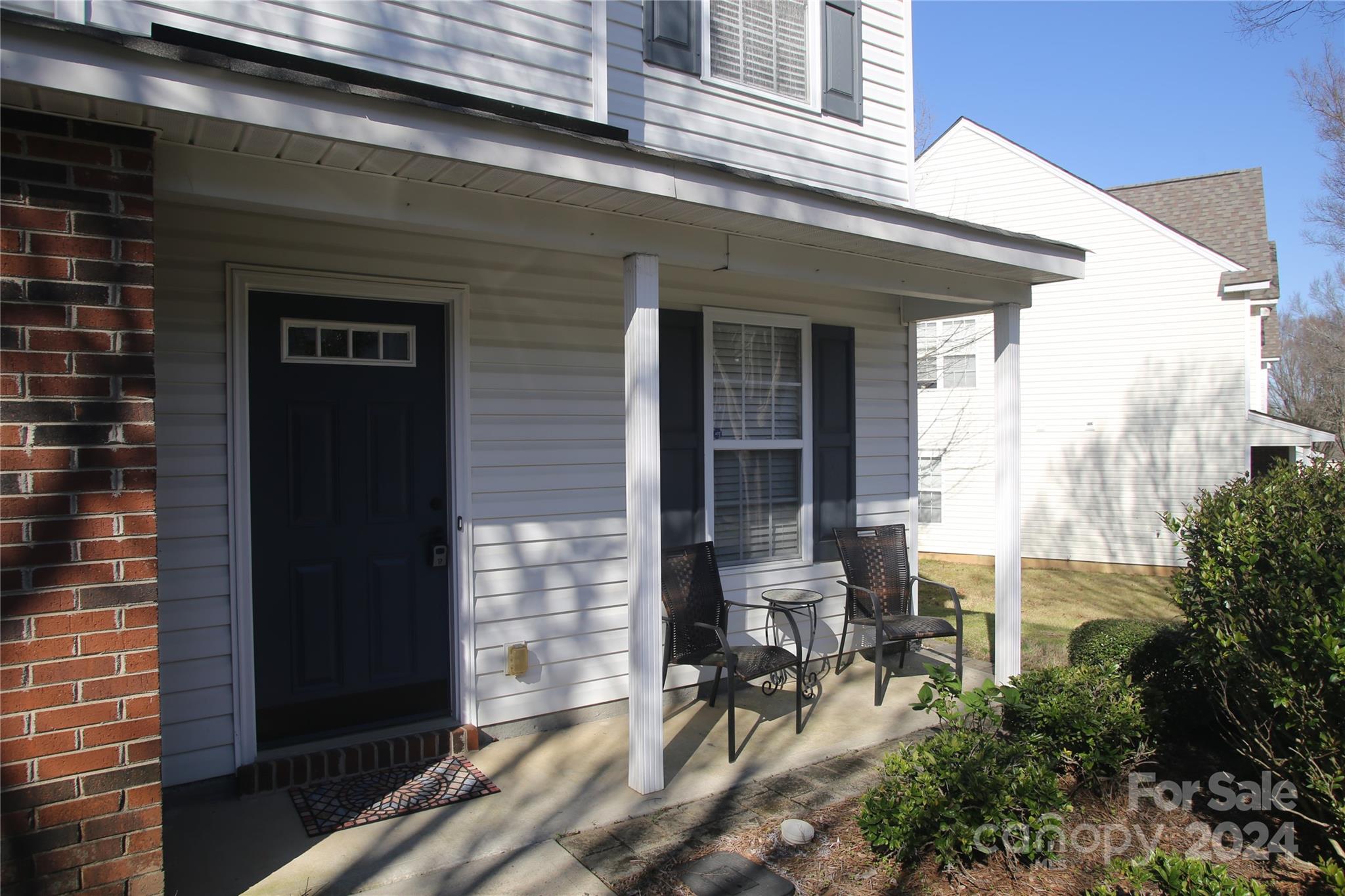 11330 Stone Trail Road Charlotte, NC 28213 - Photo 5 of 24 view of the house with outdoor seating