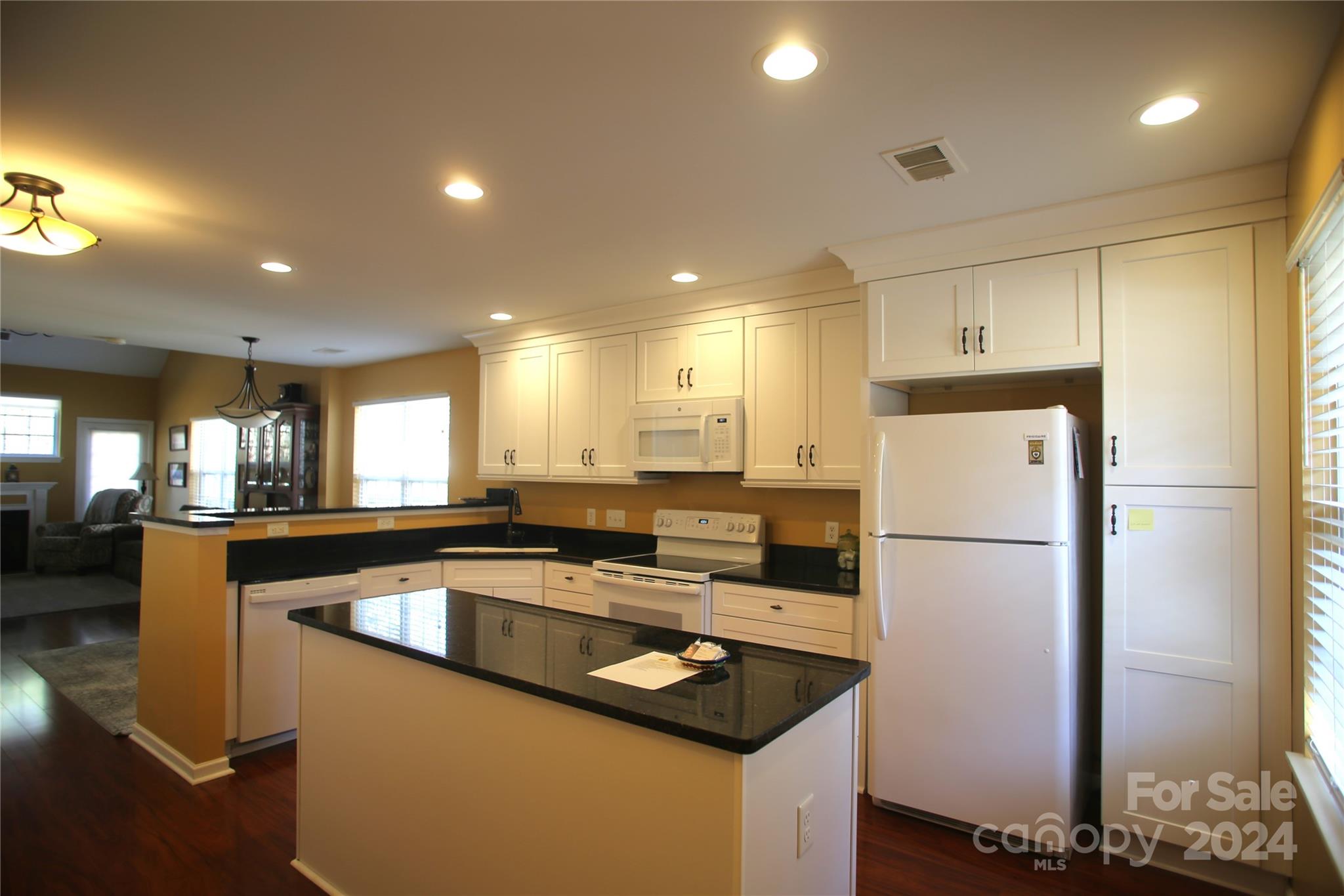 11330 Stone Trail Road Charlotte, NC 28213 - Photo 6 of 24 a kitchen with a refrigerator a sink and a refrigerator