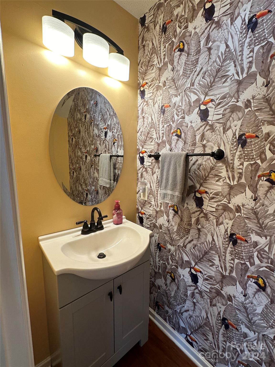 11330 Stone Trail Road Charlotte, NC 28213 - Photo 9 of 24 a bathroom with a sink and mirror