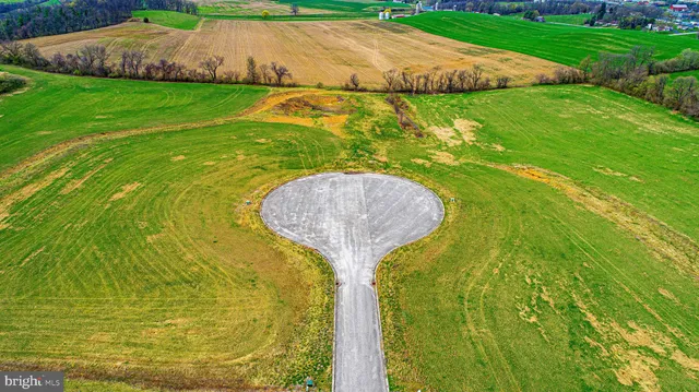 a view of a swimming pool with a fountain