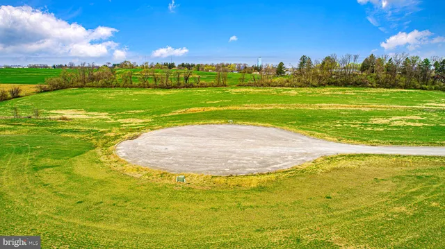 a view of a swimming pool with an ocean view