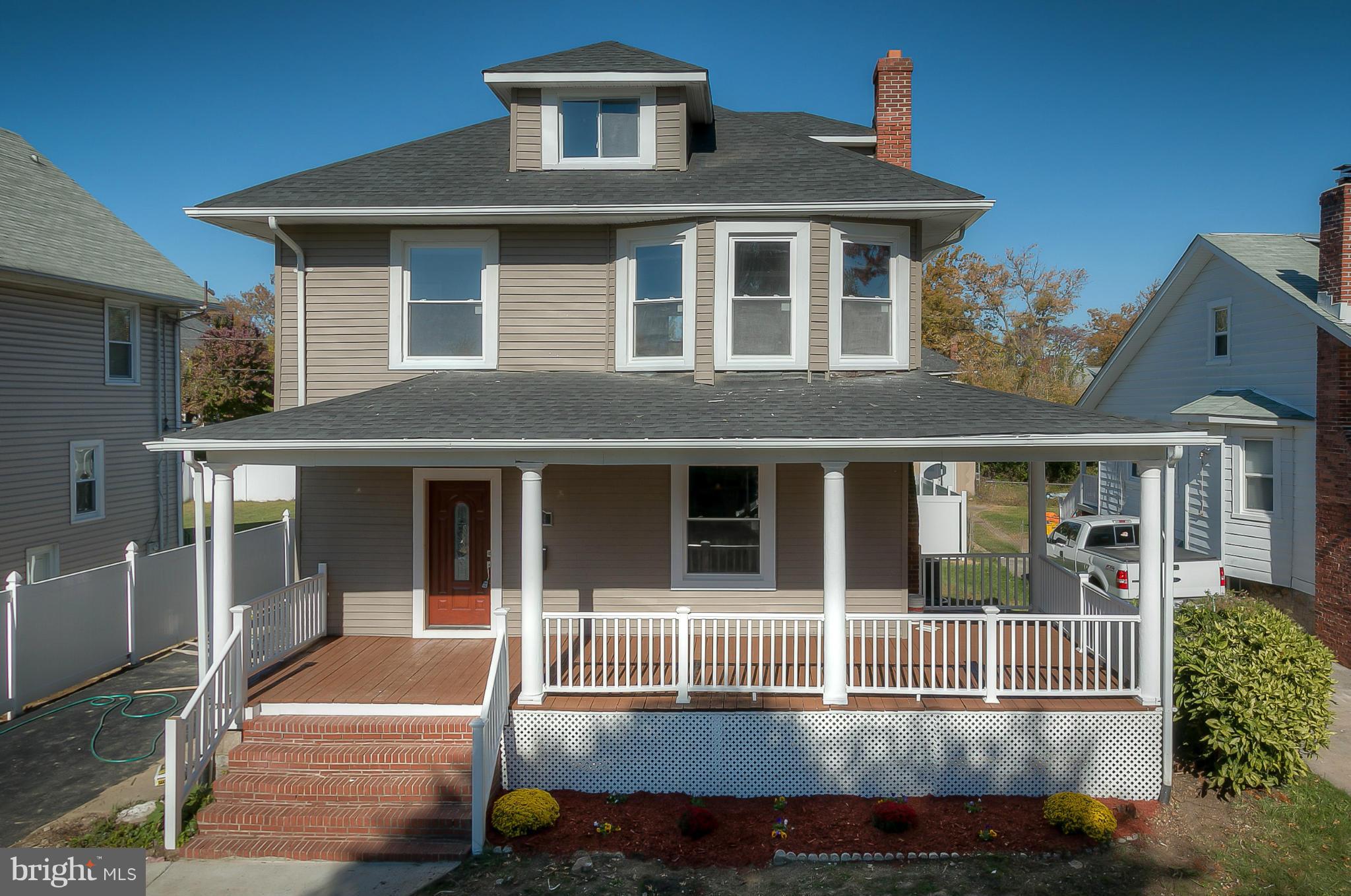 3714 Barrington Road Baltimore, MD 21215 - Photo 1 of 1 a front view of a house with a yard