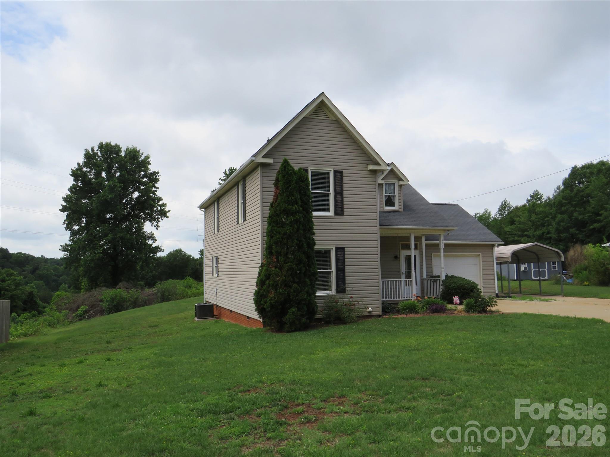 506 Pleasant Street Spindale, NC 28160 - Photo 42 of 42 a view of house with backyard