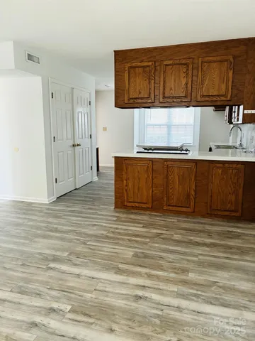 view of kitchen with granite countertop cabinets