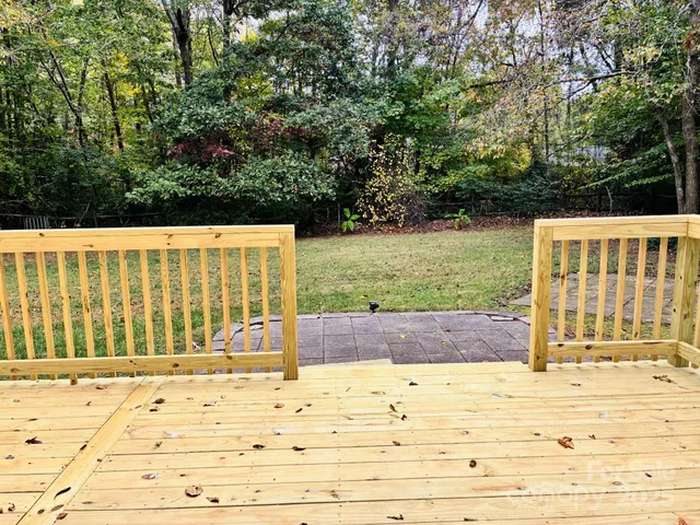 a view of a backyard of the house