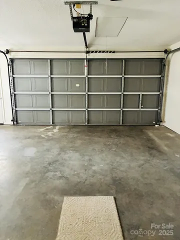 a view of a room with shelf on the wall