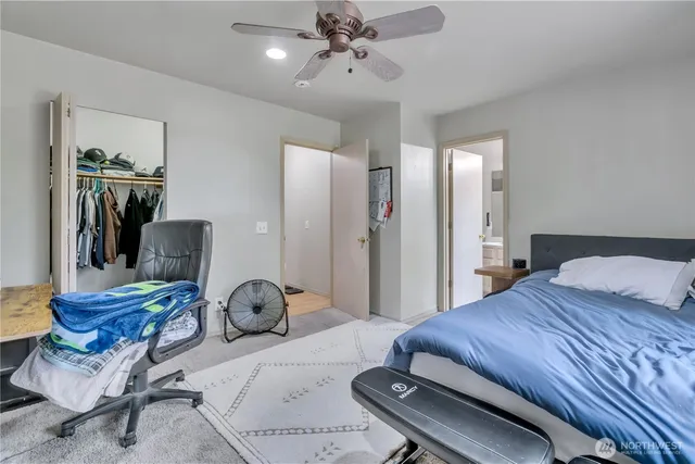 a bedroom with a bed and furniture