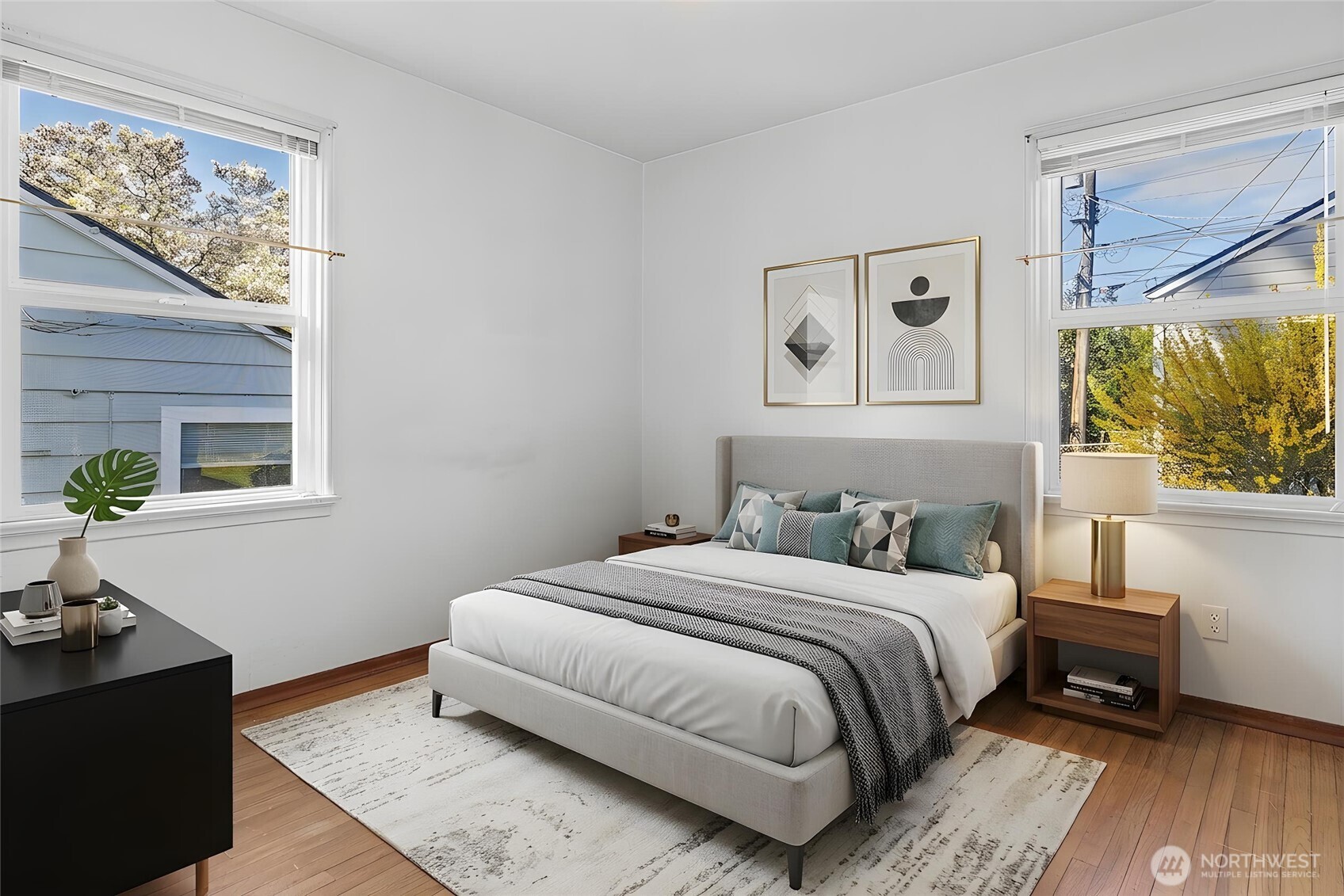 4437 47th Avenue Southwest Seattle, WA 98116 - Photo 21 of 39 a bedroom with a bed and a window