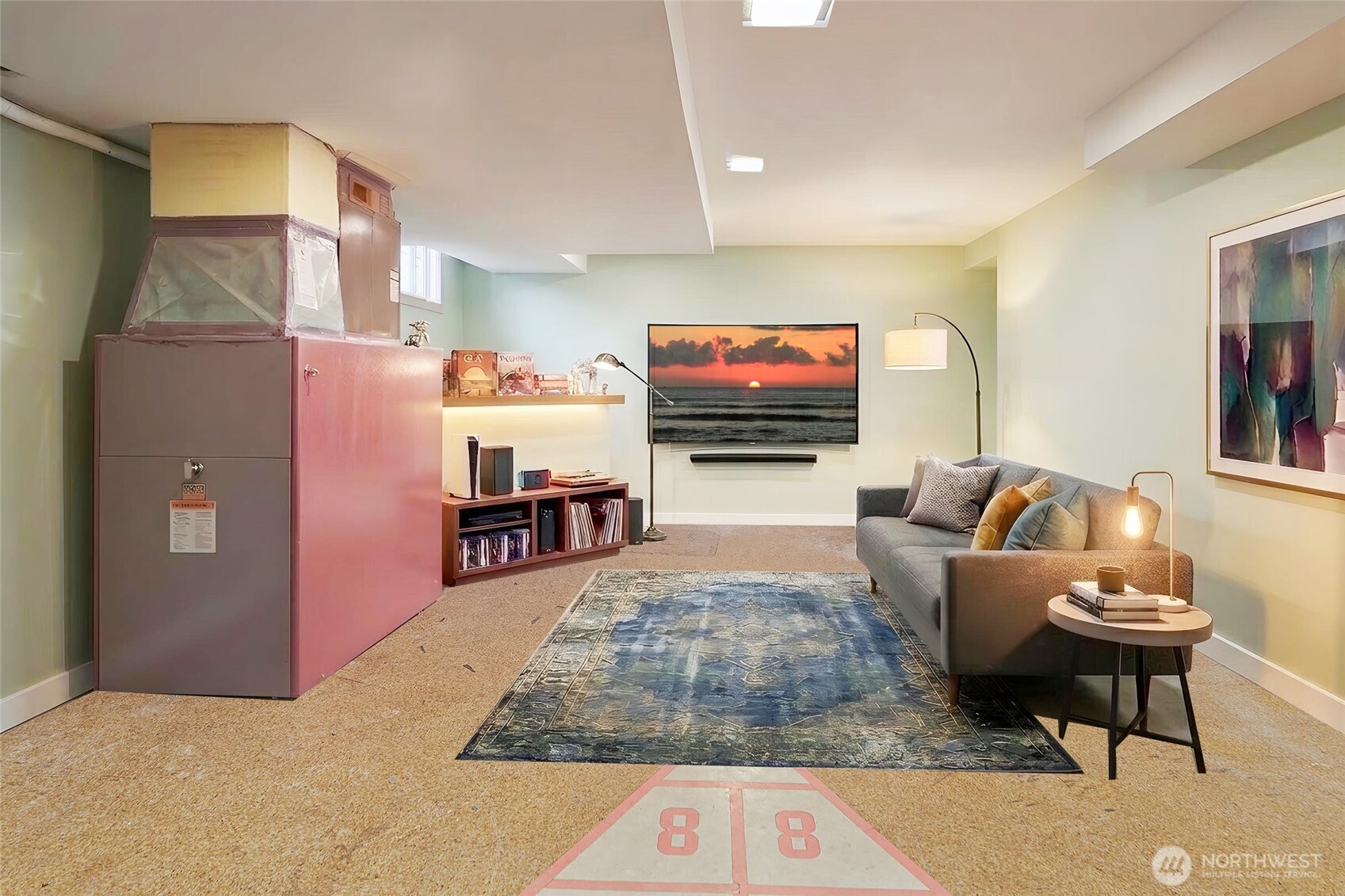 4437 47th Avenue Southwest Seattle, WA 98116 - Photo 27 of 39 a living room with furniture and a flat screen tv