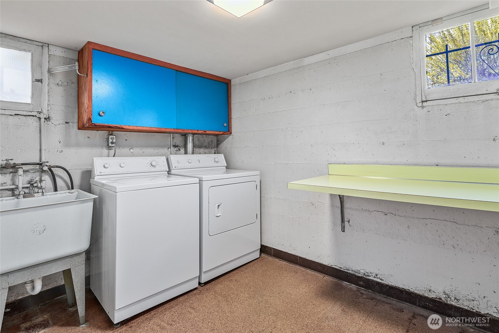 4437 47th Avenue Southwest Seattle, WA 98116 - Photo 33 of 39 a utility room with dryer and washer