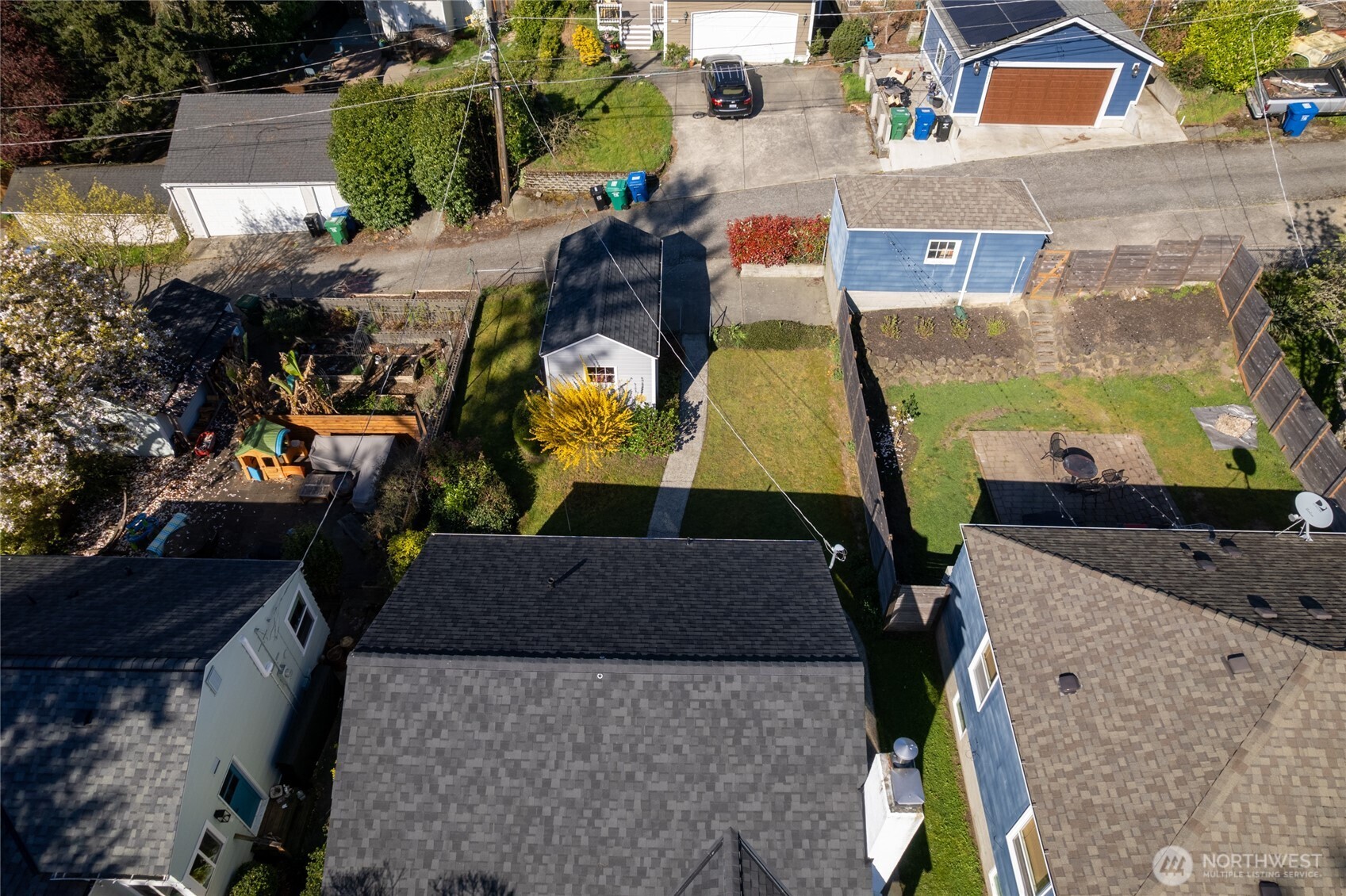 4437 47th Avenue Southwest Seattle, WA 98116 - Photo 34 of 39 an aerial view of a house with a yard